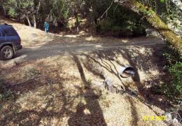 Before: Undersized, rusted, and perched culvert at this stream crossing has a high potential for failure