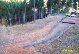 Before: Un-permitted grading and modification to the stream network has triggered significant erosion and hillslope instability