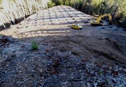 Before: Un-permitted hilltop grading for marijuana cultivation has caused erosion and degraded water quality in Outlet Creek.