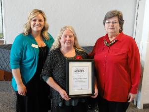 Kathy receiving the Spirit of the Red Cross Award