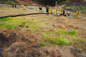 California Conservation Corps crew members implement emergency erosion control measures under PWA technical supervision