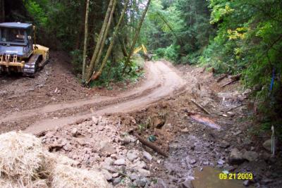 Before: Legacy streamside logging road in Rocky Gulch was reopened for heavy equipment restoration work