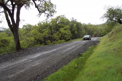 After: Installation of a rolling dip disperses runoff towards the outboard edge of the road and improves road surface drainage