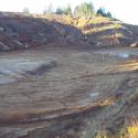 Grading and road construction associated with site preparation for un-permitted development.